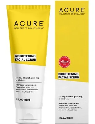 Acure Brightening Facial Scrub in a green squeeze tube with purple label