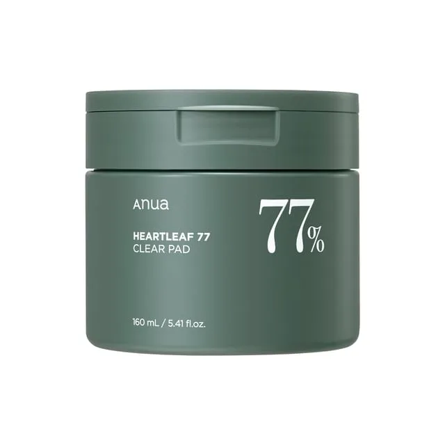 Anua Heartleaf 77% Clear Pad in a dark green round jar with included tweezers