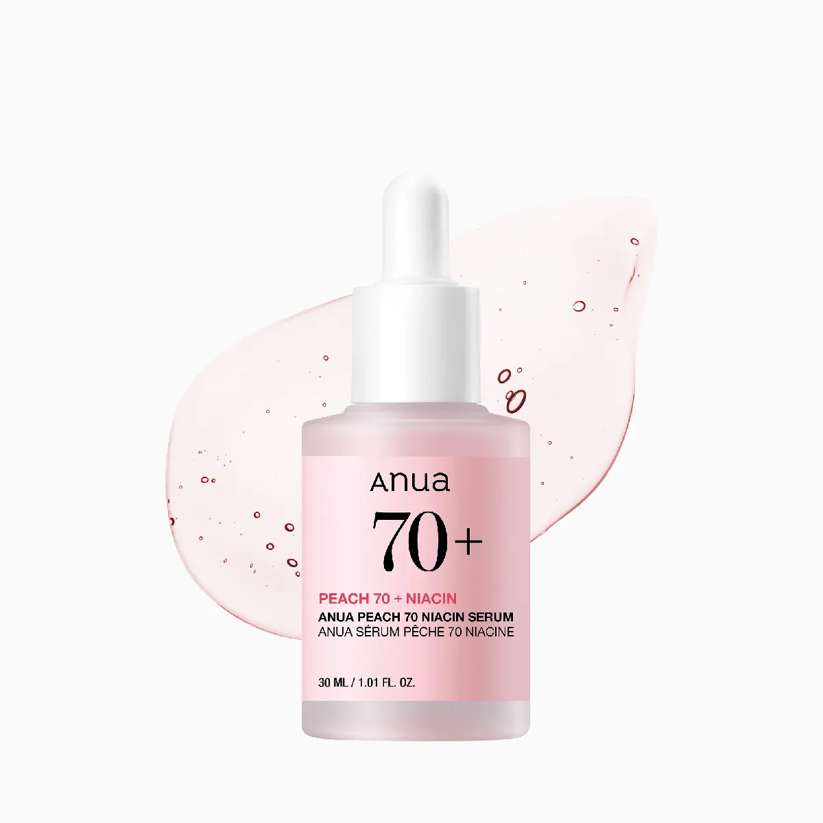 Anua Peach 70 Niacin Serum in a frosted glass bottle with dropper and peach-toned branding