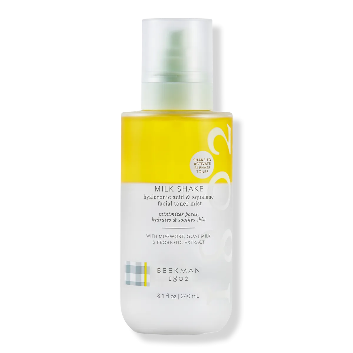 Beekman 1802 Milk Shake Toner Mist in clear glass bottle showing bi-phase separation