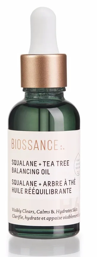 Biossance Squalane + Tea Tree Balancing Oil in a frosted glass dropper bottle