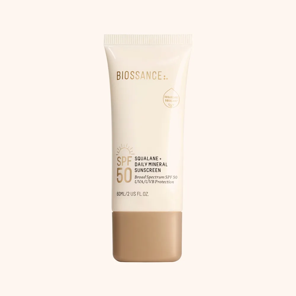 Biossance Squalane + Zinc Sheer Mineral Sunscreen SPF 30 in a white squeeze tube