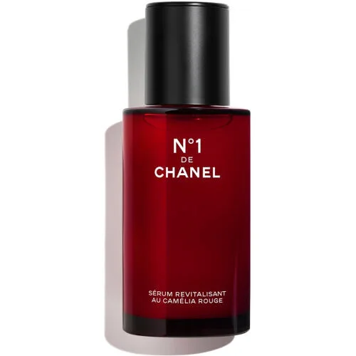 Chanel N°1 De Chanel Revitalizing Serum in eco-designed glass bottle with red camellia branding