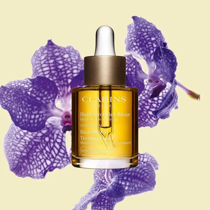 Clarins Blue Orchid Face Treatment Oil in glass bottle with dropper