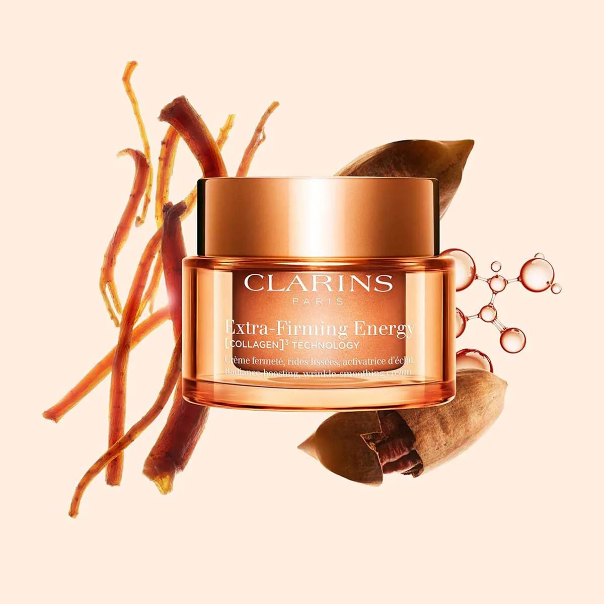 Clarins Extra-Firming Energy Cream refillable jar with rosy-peach tinted moisturizer