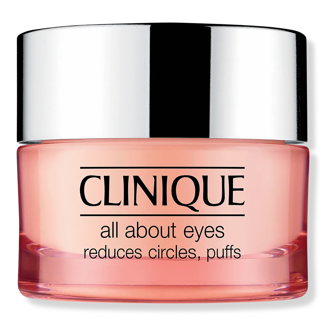 Clinique All About Eyes cream in small green glass jar with silver lid