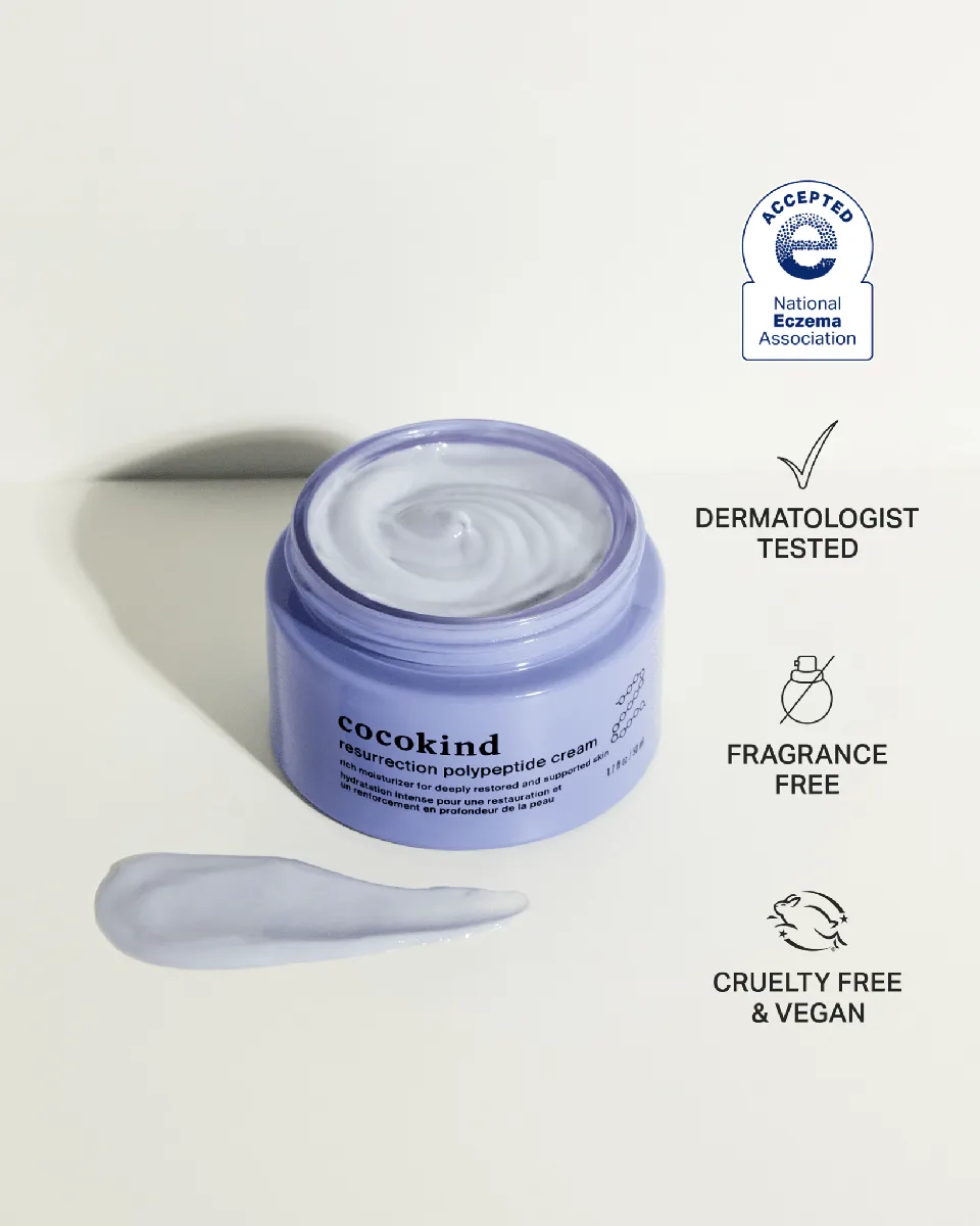 Cocokind Resurrection Polypeptide Cream in distinctive purple-tinted glass jar showing the cream's natural violet color