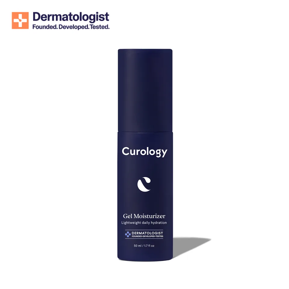 Curology The Moisturizer gel in navy blue airless pump bottle with minimalist white branding