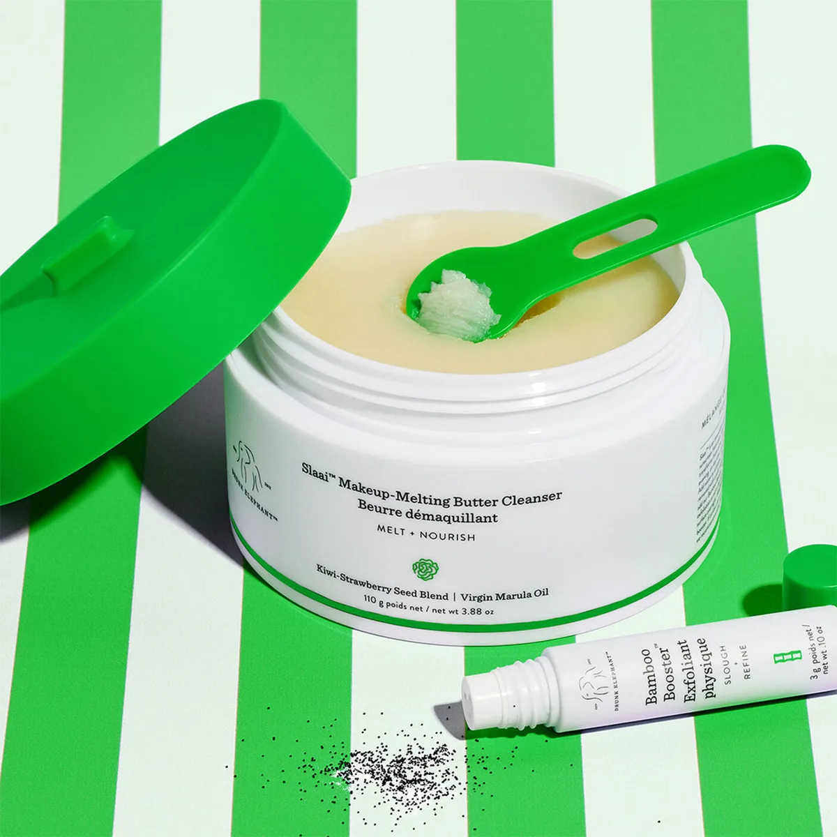 Drunk Elephant Slaai Makeup-Melting Butter Cleanser in white jar with green lid