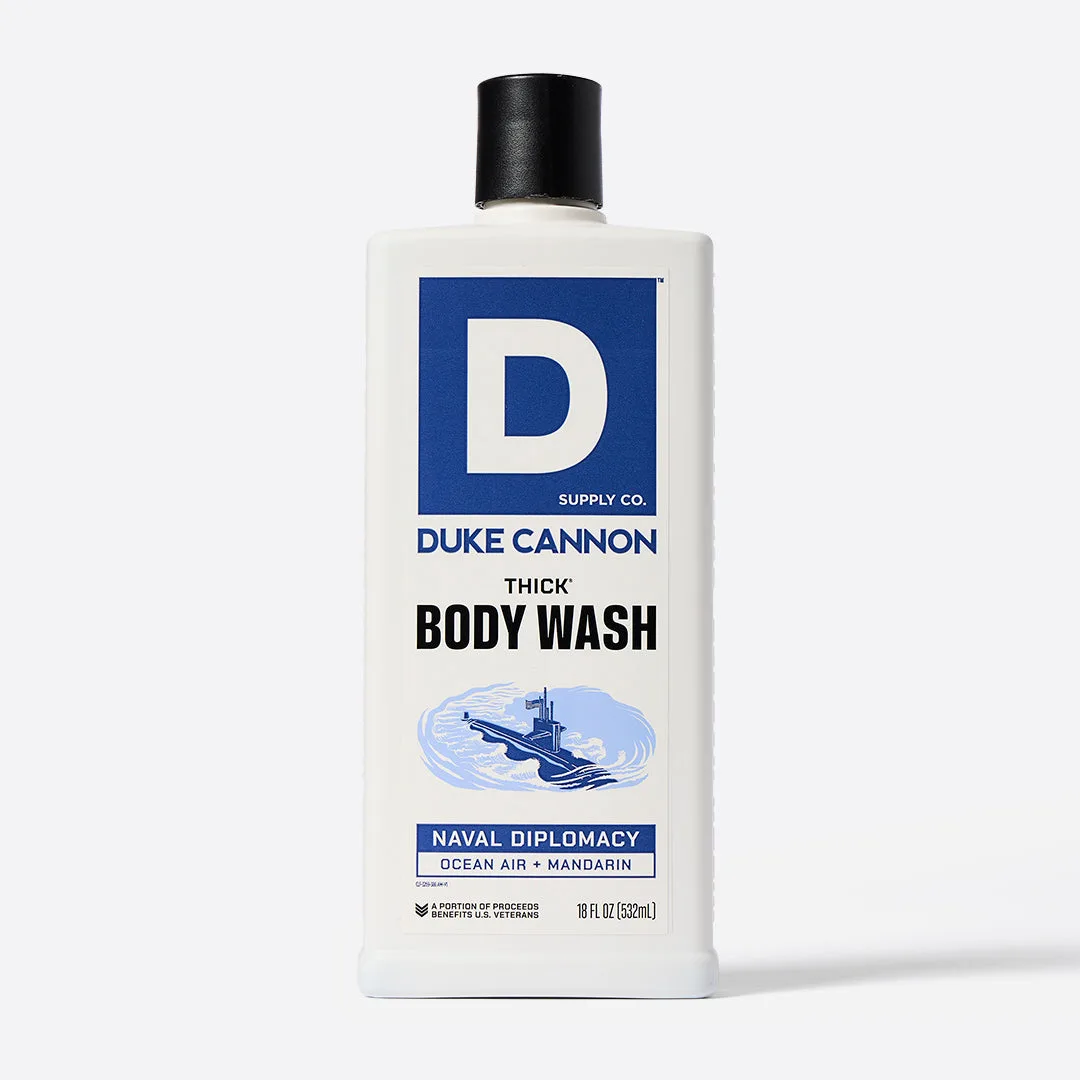 Duke Cannon Thick High-Viscosity Body Wash Naval Diplomacy dark blue bottle with bold typography