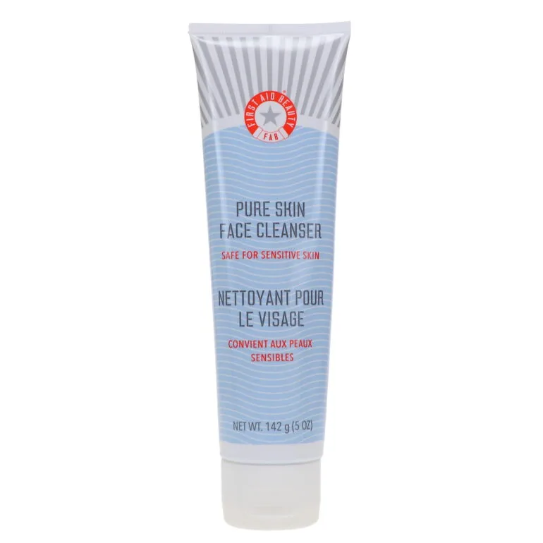 First Aid Beauty Pure Skin Face Cleanser in a white tube with red FAB branding