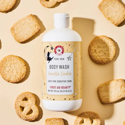 First Aid Beauty Pure Skin Foaming Body Wash bottle with holiday-themed packaging