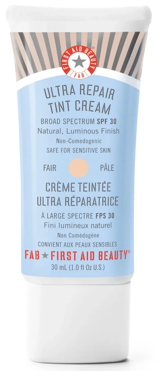 First Aid Beauty Ultra Repair Tinted Moisturizer SPF 30 in white tube with red accents