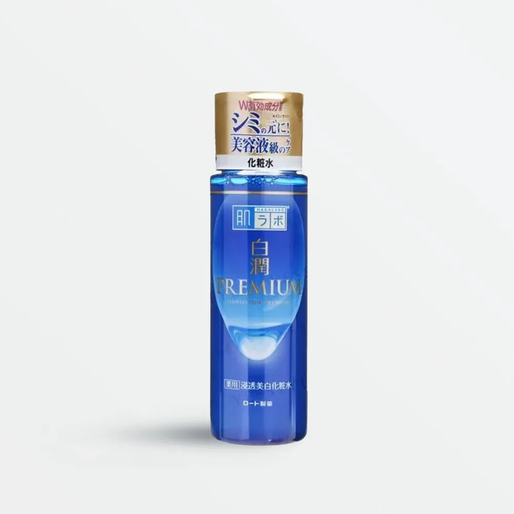 Hada Labo Shirojyun Premium Whitening Lotion in a white bottle with blue premium branding