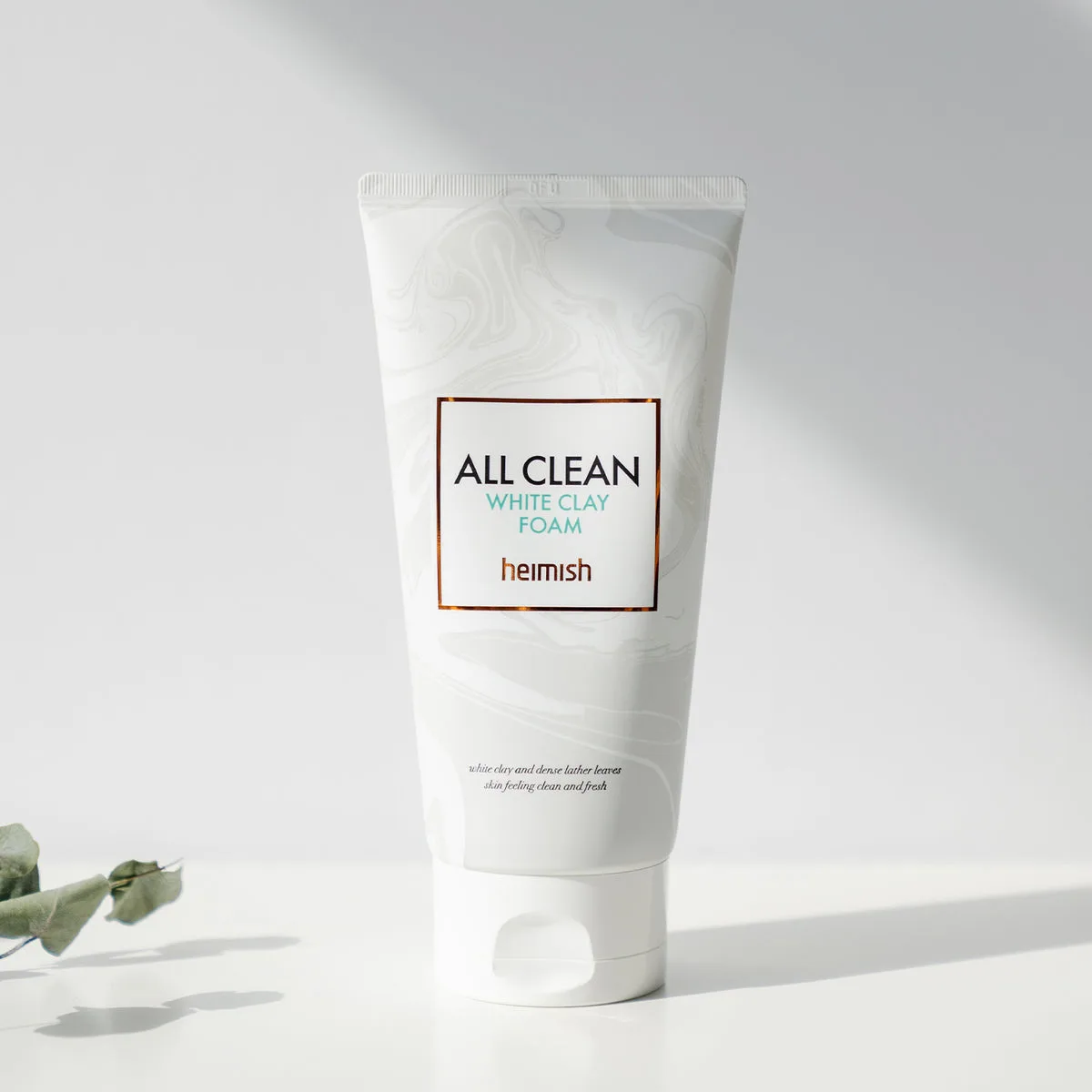 Heimish All Clean White Clay Foam cleanser in white tube with minimalist design