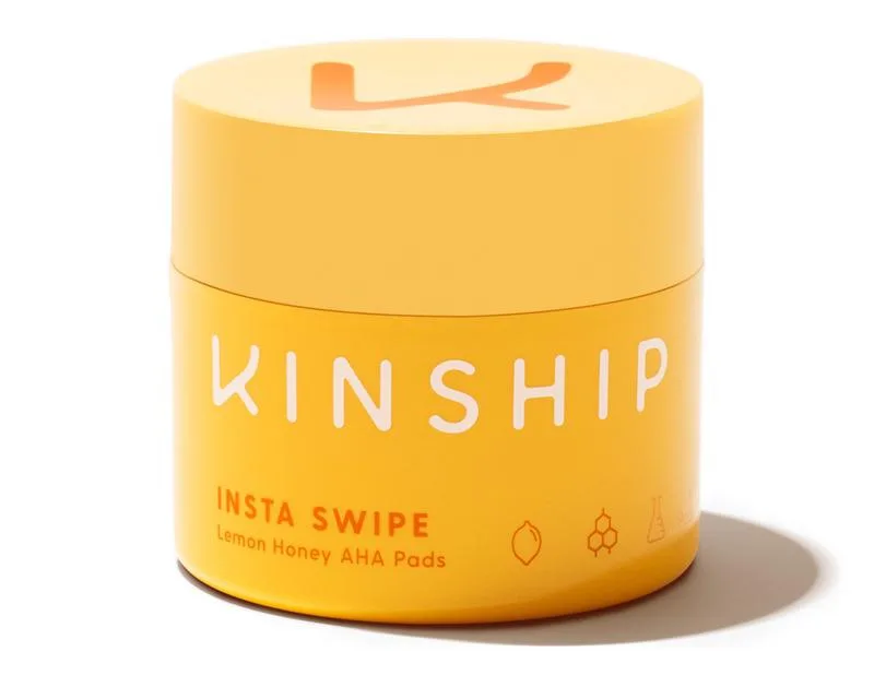 Kinship Insta Swipe Lemon Honey AHA Exfoliating Pads in a round clean-beauty jar