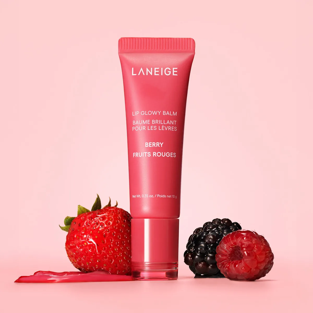Laneige Lip Glowy Balm in a small pastel squeeze tube with slanted applicator tip