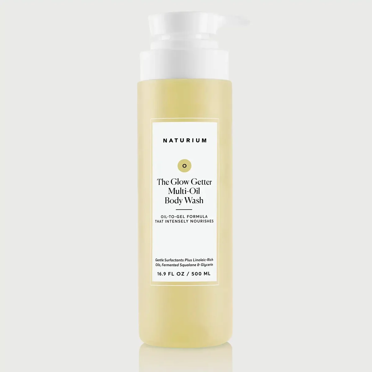 Naturium The Glow Getter Multi-Oil Hydrating Body Wash 16.9 fl oz bottle with minimalist white packaging