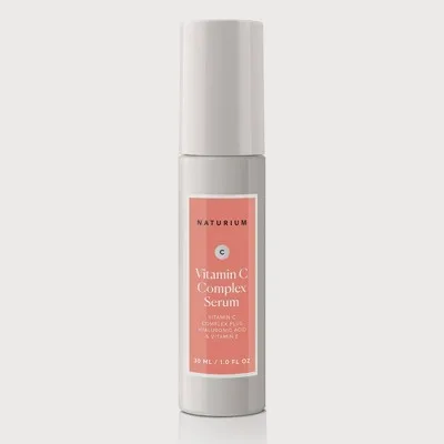 Naturium Vitamin C Complex Serum frosted glass bottle with dropper showing golden liquid