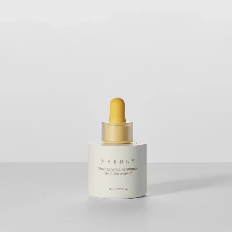 NEEDLY Real Vitamin C Serum in a 30ml glass dropper bottle with yellow accent branding