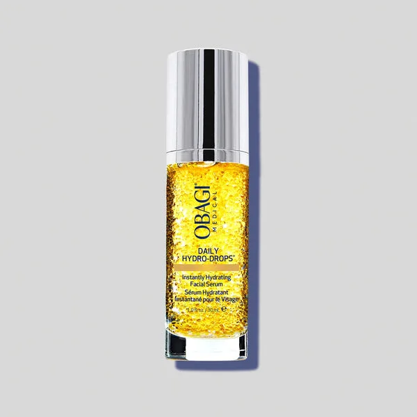 Obagi Daily Hydro-Drops Face Moisturizer in a glass bottle showing visible suspended oil droplets