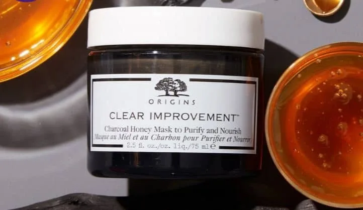 Origins Clear Improvement Charcoal Honey Mask golden-tinted clay mask in a jar