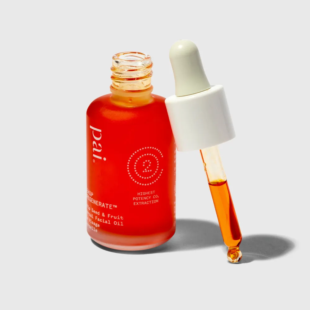 Pai Skincare Rosehip BioRegenerate Oil in an amber glass dropper bottle showing the deep orange oil
