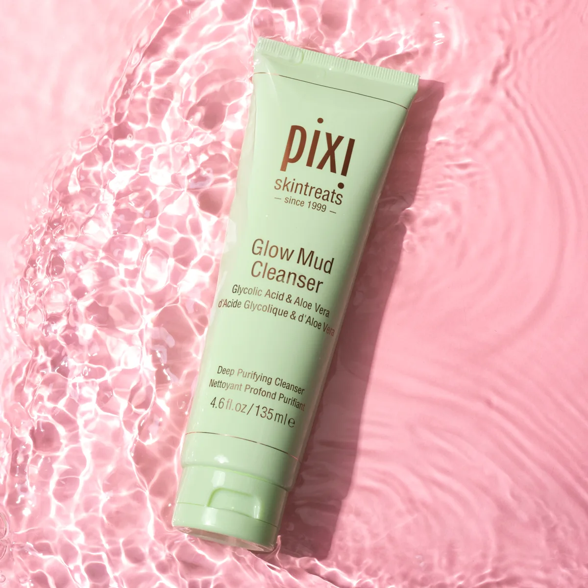 Pixi Glow Mud Cleanser green tube with exfoliating glycolic acid face wash