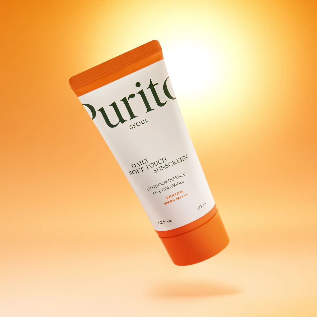 Purito Daily Soft Touch Sunscreen SPF 50+ in a white squeeze tube with minimalist Purito Seoul branding
