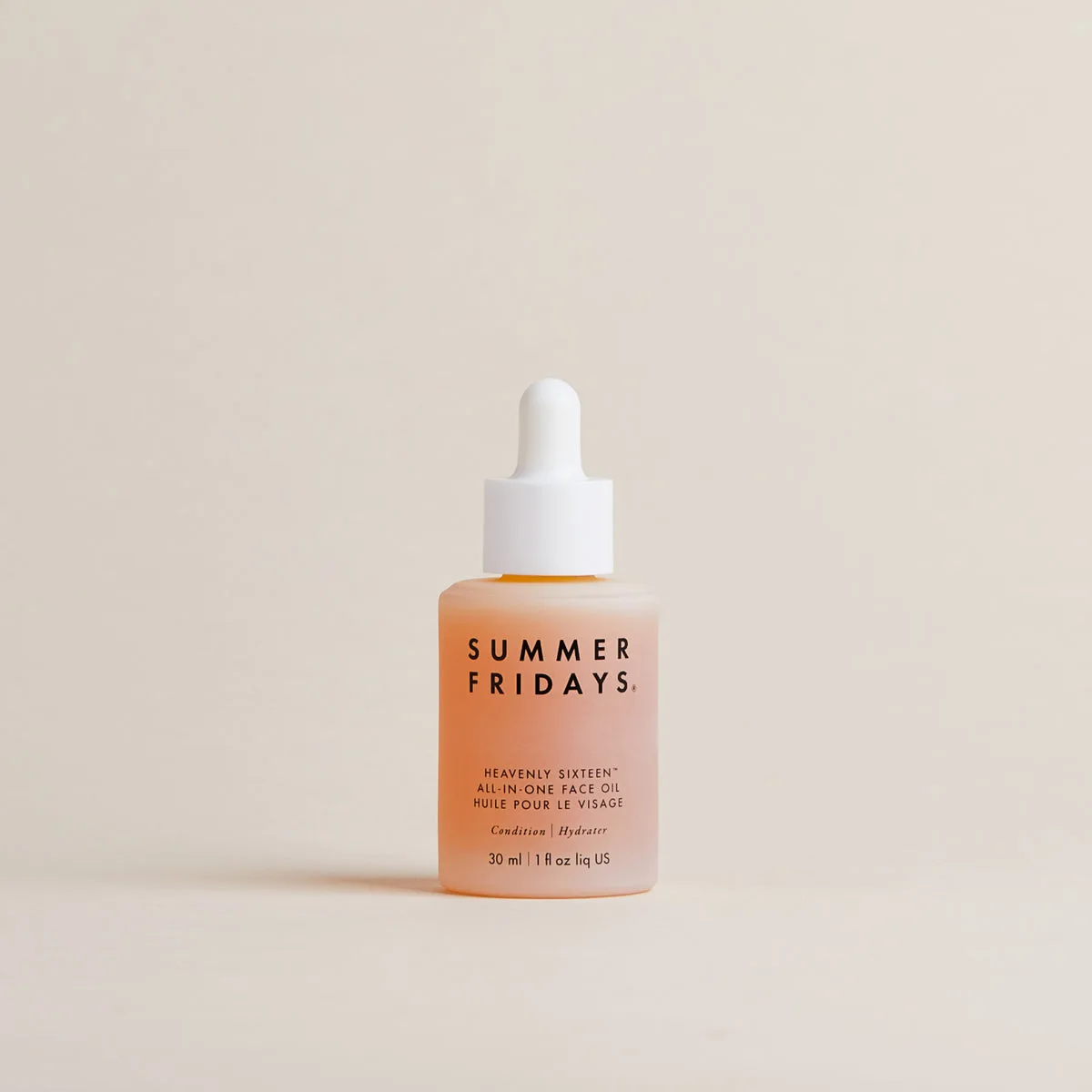 Summer Fridays Heavenly Sixteen All-in-One Face Oil in glass dropper bottle with golden oil