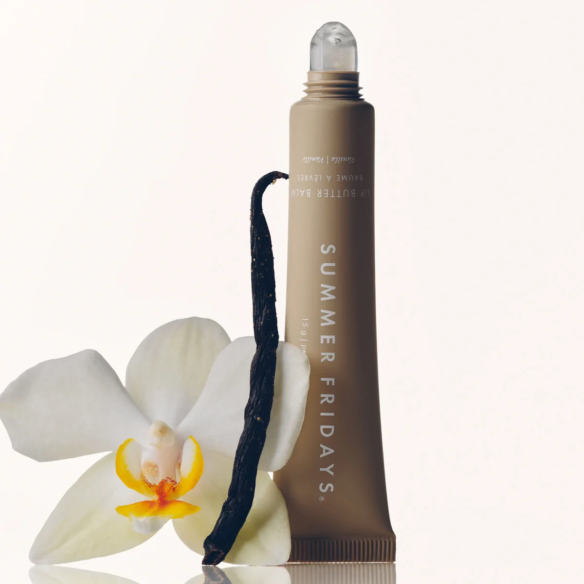 Summer Fridays Lip Butter Balm in sleek squeeze tube with curved applicator tip