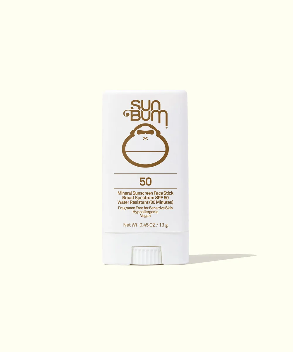 Sun Bum Mineral SPF 50 Sunscreen Face Stick in yellow twist-up tube with Sonny mascot
