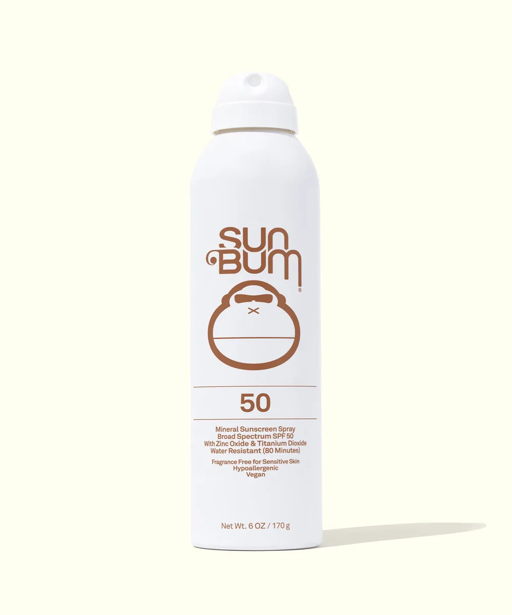 Sun Bum Mineral SPF 50 Sunscreen Spray in yellow and teal aluminum spray can with Sonny mascot