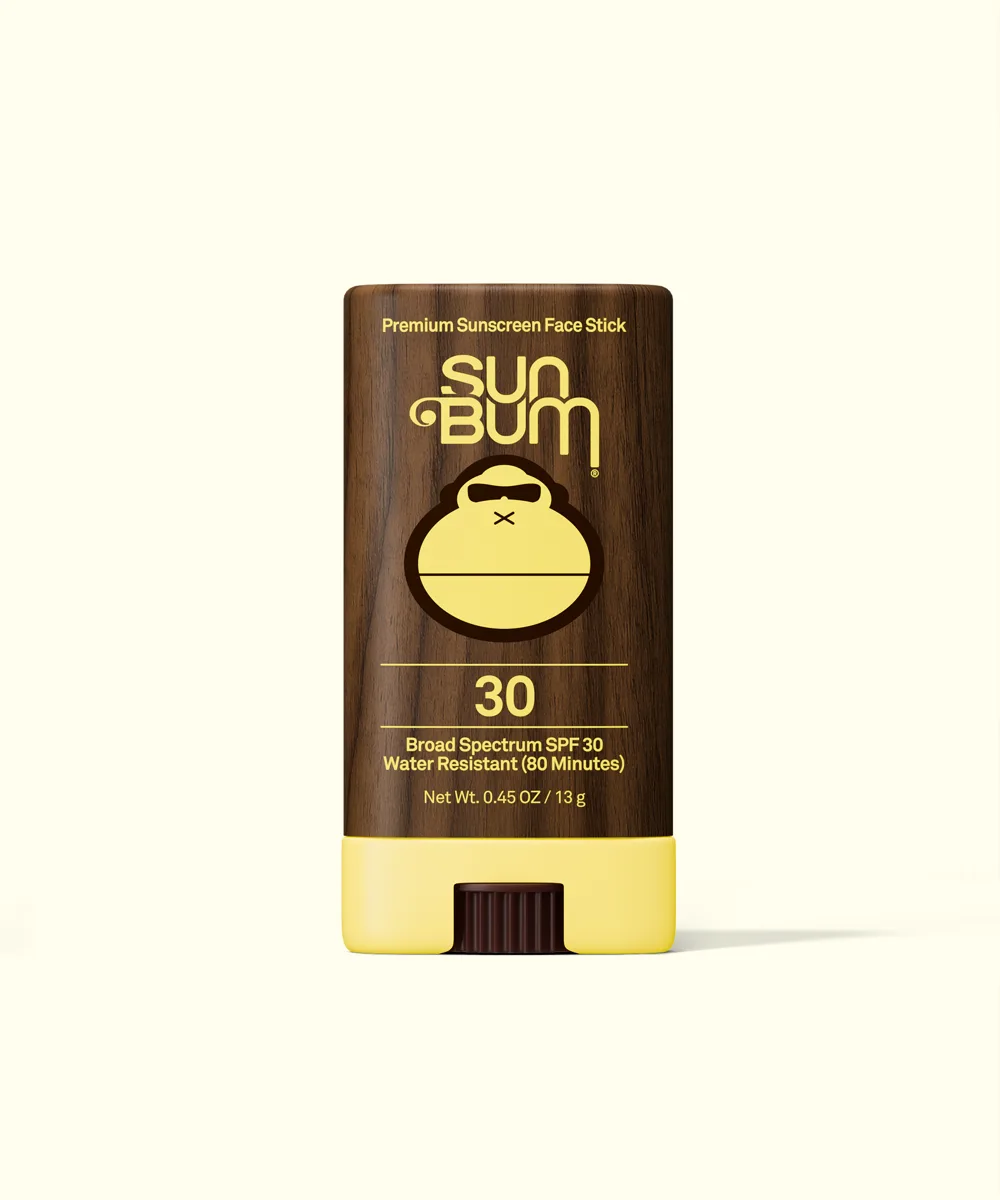 Sun Bum Original SPF 30 Sunscreen Face Stick in its signature yellow twist-up tube with Sonny mascot