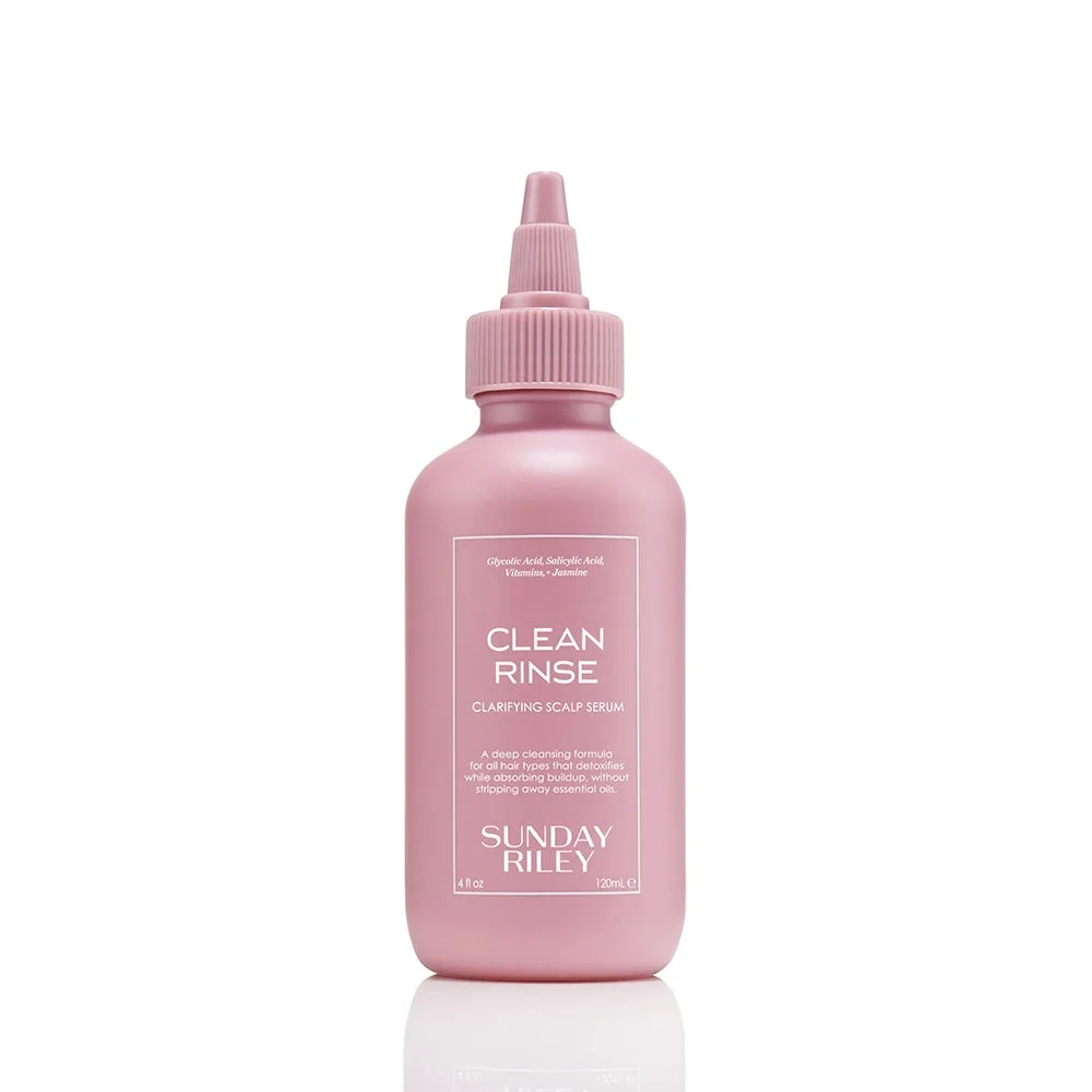 Sunday Riley Clean Rinse Clarifying Scalp Serum in a squeeze bottle with pointed nozzle applicator