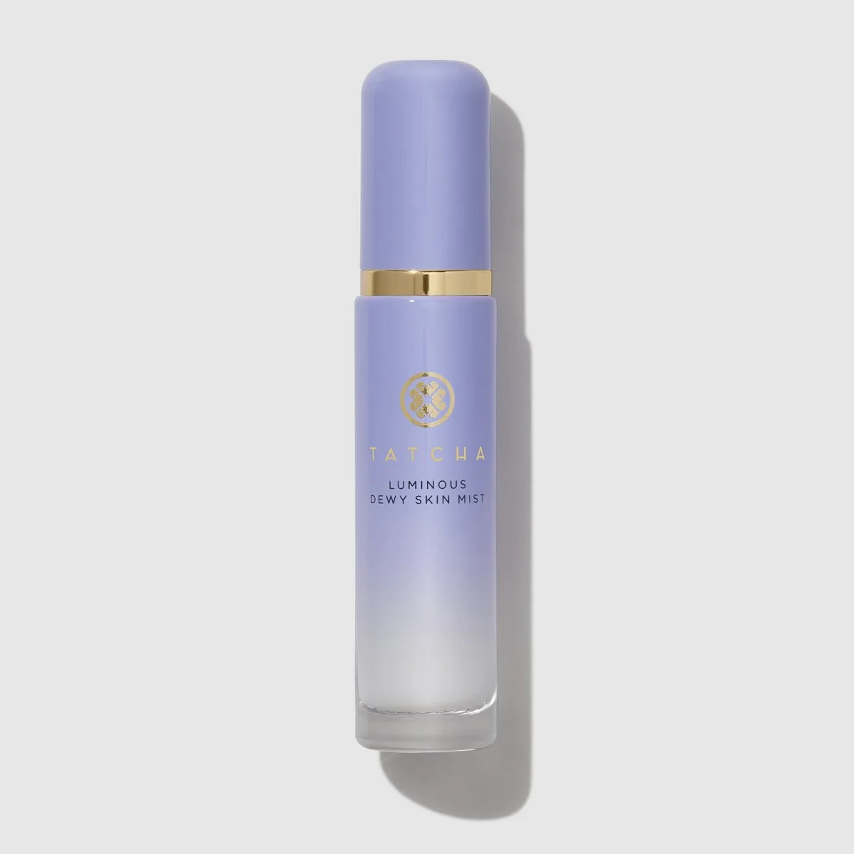 Tatcha Luminous Dewy Skin Mist in a frosted glass bottle with gold spray nozzle