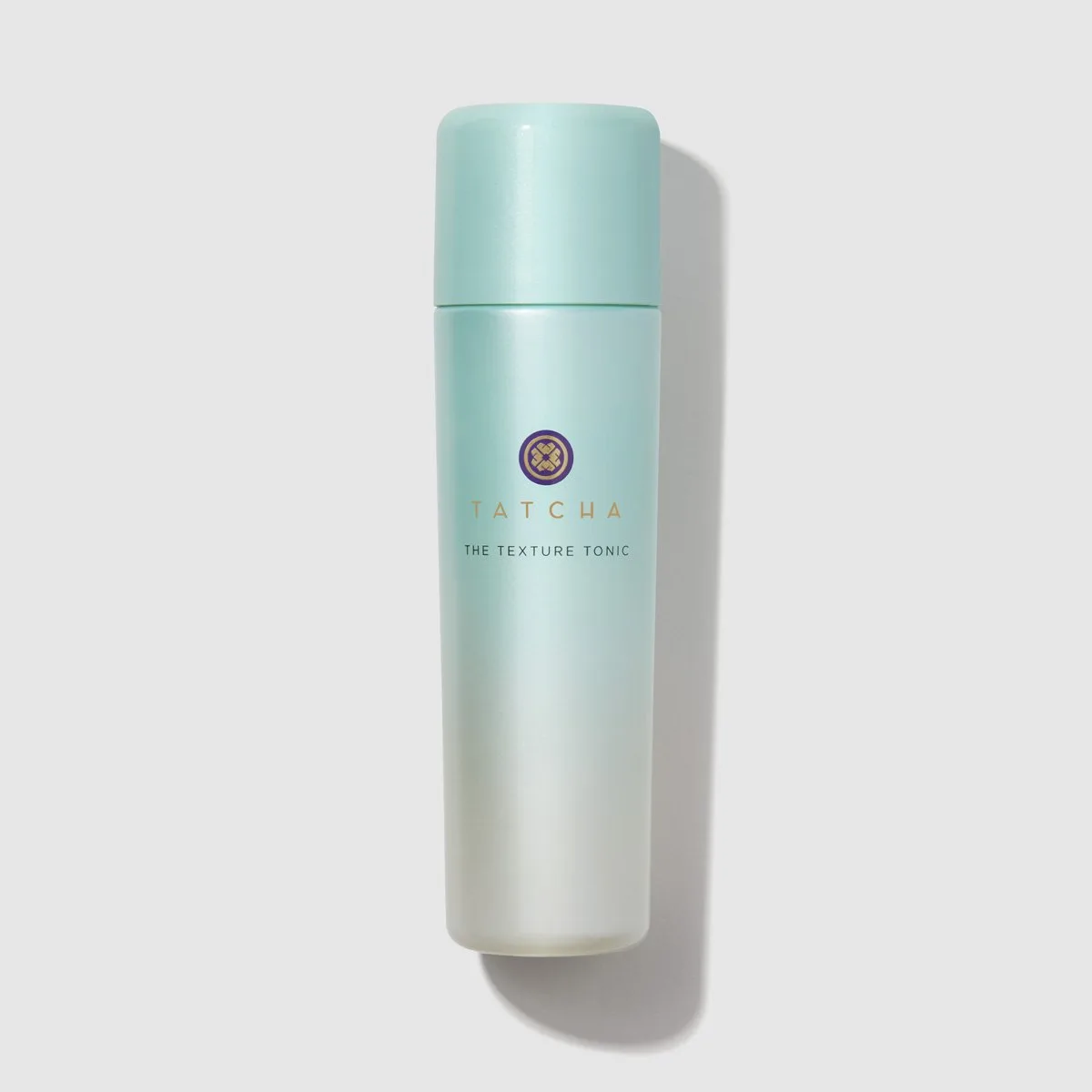 Tatcha The Texture Tonic AHA Liquid Exfoliating Treatment in frosted purple glass bottle