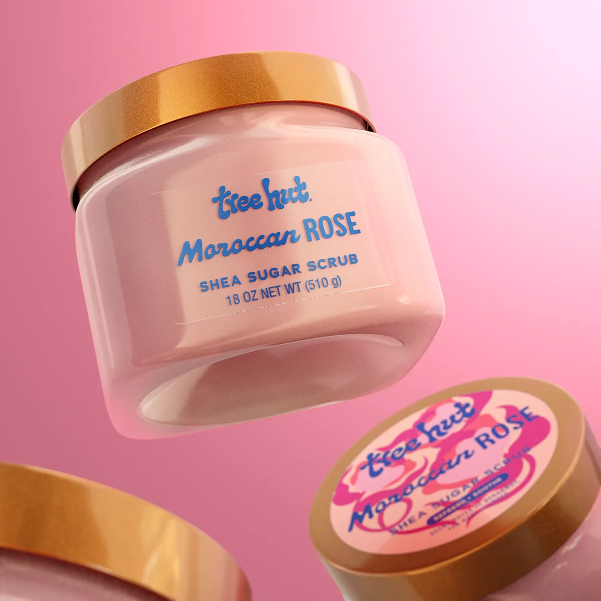 Tree Hut Moroccan Rose Shea Sugar Scrub in pink-labeled plastic tub